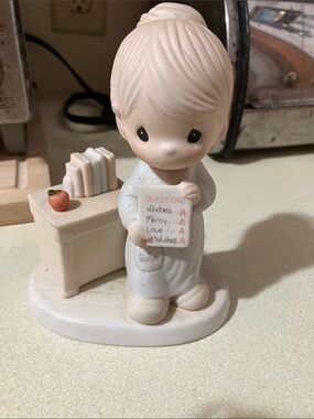 Precious Moments Teacher Figurine in Cream, White and Red Apple Accent